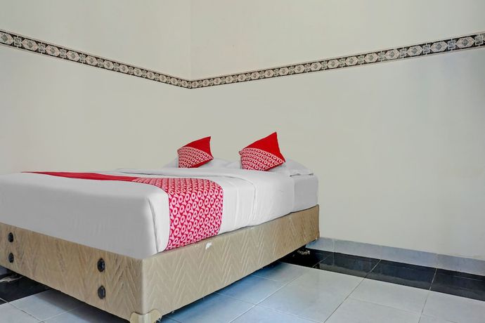 Imagen de la habitación del Hotel OYO 90260 Bumi Merpati Residence. Foto 6