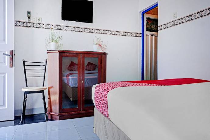 Imagen de la habitación del Hotel OYO 90260 Bumi Merpati Residence. Foto 7
