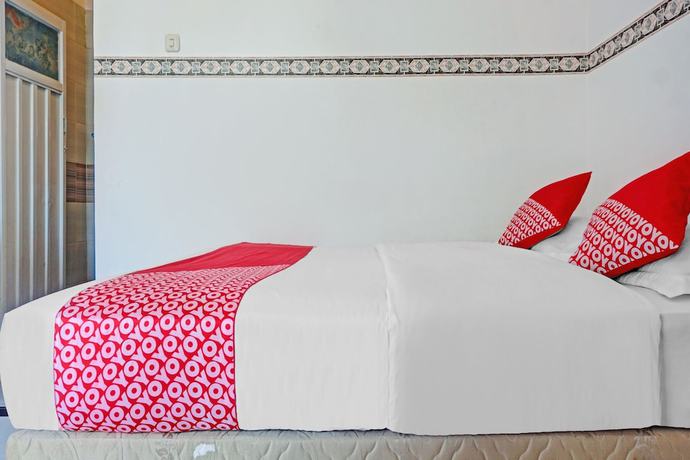 Imagen de la habitación del Hotel OYO 90260 Bumi Merpati Residence. Foto 9