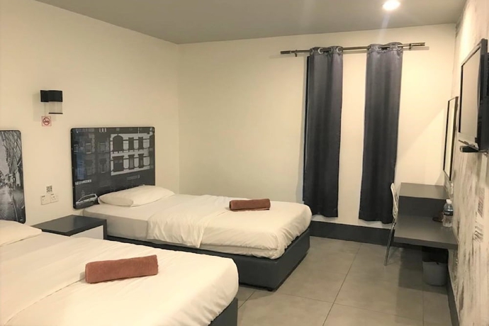 Imagen de la habitación del Hotel OYO 90265 Hotel Ventura. Foto 2