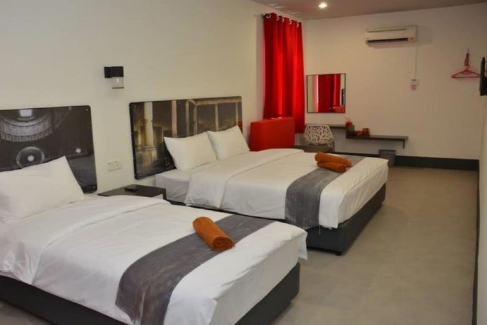 Imagen de la habitación del Hotel OYO 90265 Hotel Ventura. Foto 3
