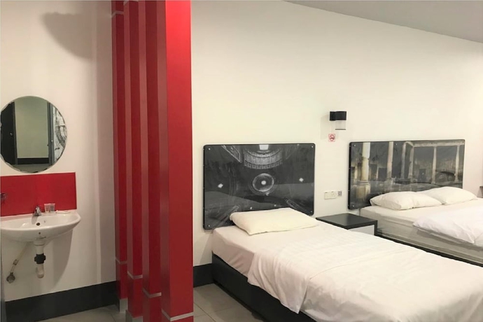 Imagen de la habitación del Hotel OYO 90265 Hotel Ventura. Foto 4