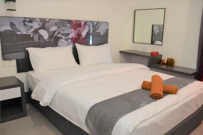 Imagen de la habitación del Hotel OYO 90265 Hotel Ventura. Foto 5
