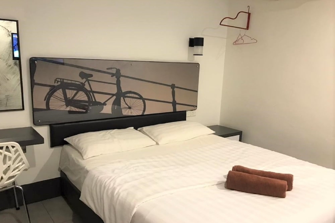 Imagen de la habitación del Hotel OYO 90265 Hotel Ventura. Foto 7