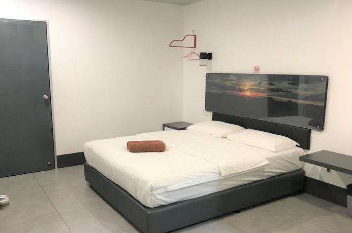 Imagen de la habitación del Hotel OYO 90265 Hotel Ventura. Foto 12