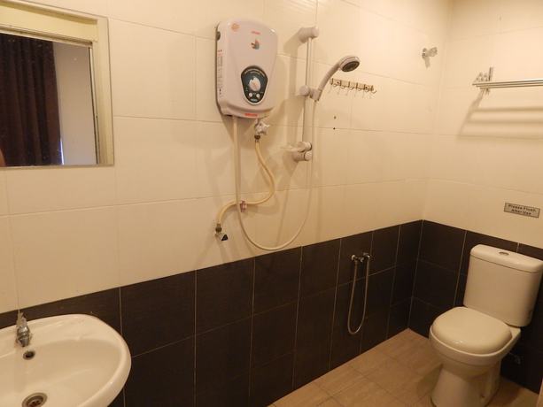 Imagen de la habitación del Hotel OYO 90270 South City. Foto 4