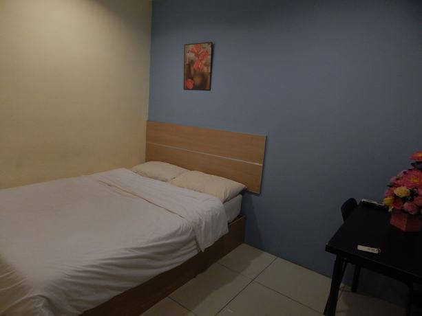 Imagen de la habitación del Hotel OYO 90270 South City. Foto 5