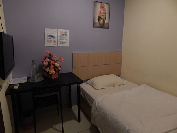 Imagen de la habitación del Hotel OYO 90270 South City. Foto 9