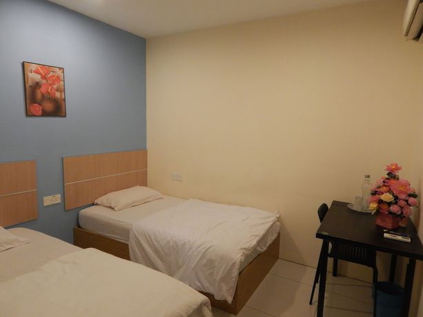 Imagen de la habitación del Hotel OYO 90270 South City. Foto 10