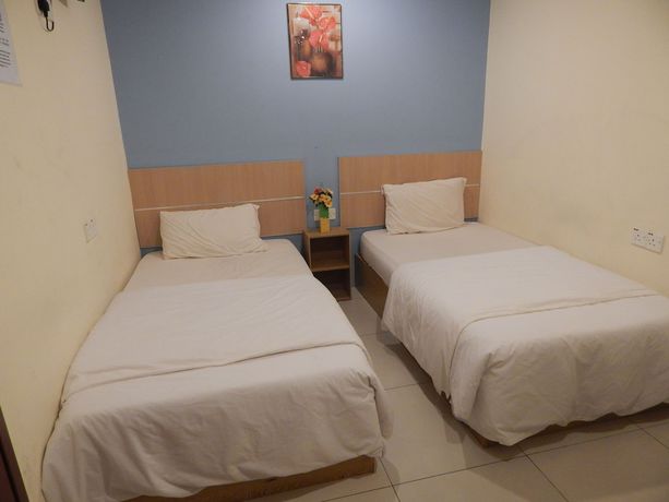 Imagen de la habitación del Hotel OYO 90270 South City. Foto 11