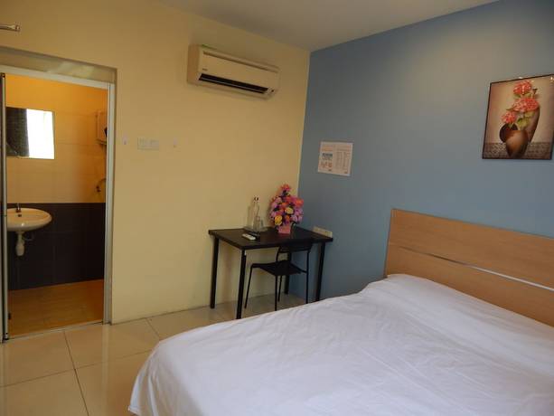 Imagen de la habitación del Hotel OYO 90270 South City. Foto 13