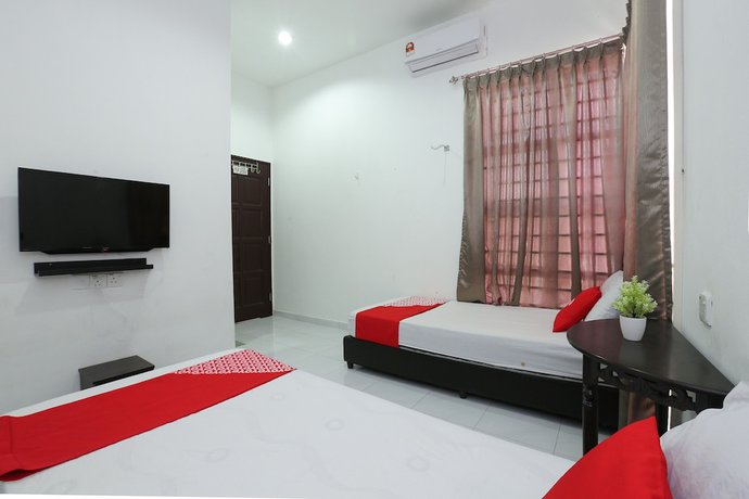 Imagen de la habitación del Hotel OYO 90274 Wadi Isfa Inn. Foto 2