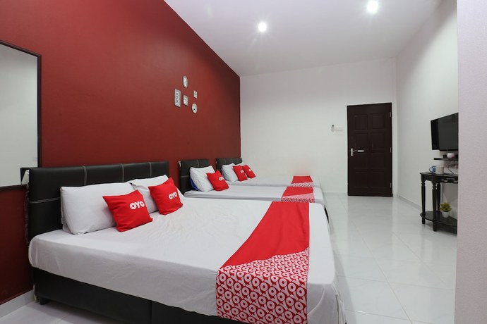 Imagen de la habitación del Hotel OYO 90274 Wadi Isfa Inn. Foto 7