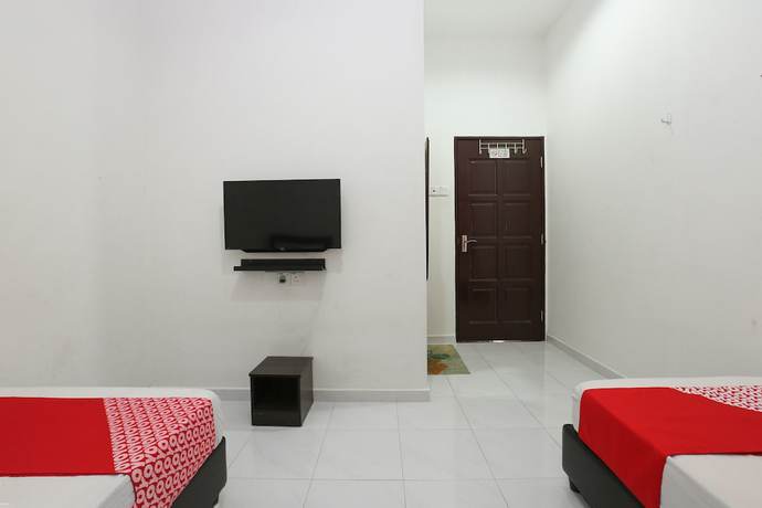 Imagen de la habitación del Hotel OYO 90274 Wadi Isfa Inn. Foto 9