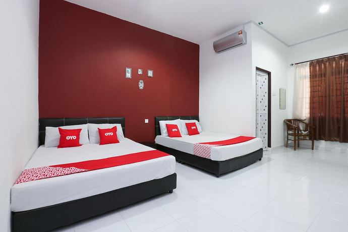 Imagen de la habitación del Hotel OYO 90274 Wadi Isfa Inn. Foto 10