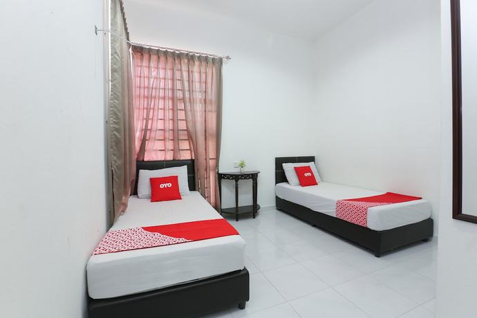 Imagen de la habitación del Hotel OYO 90274 Wadi Isfa Inn. Foto 11