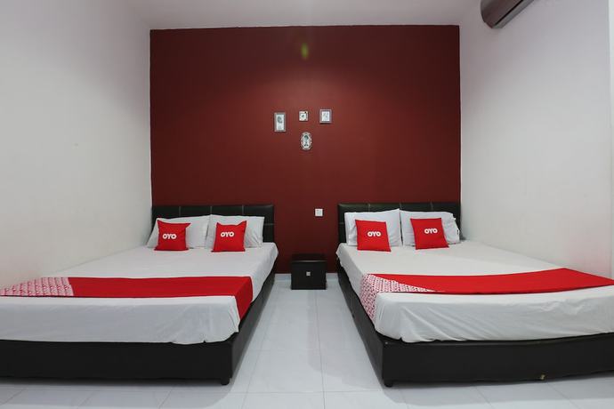 Imagen de la habitación del Hotel OYO 90274 Wadi Isfa Inn. Foto 12