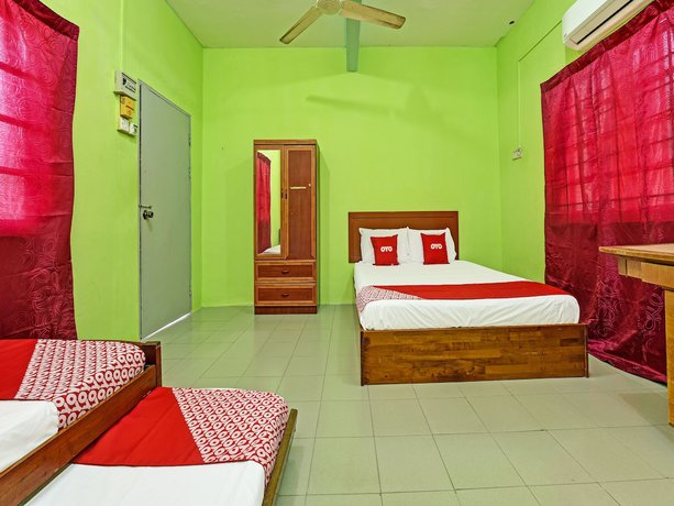 Imagen de la habitación del Hotel OYO 90278 Redzwan\'s Beach Resort. Foto 6
