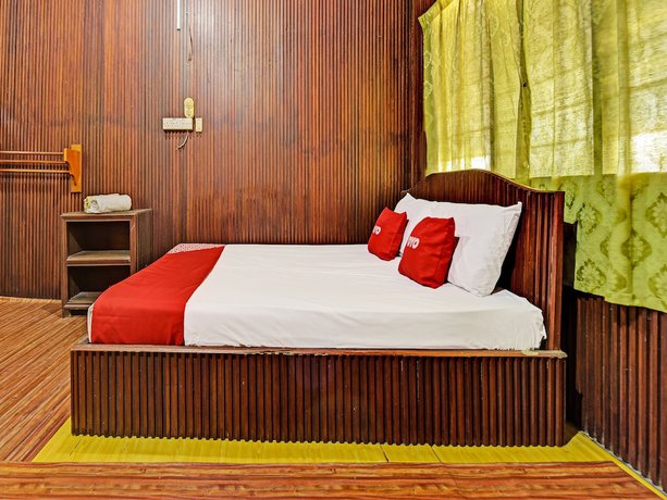 Imagen de la habitación del Hotel OYO 90278 Redzwan\'s Beach Resort. Foto 7