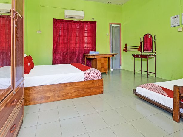 Imagen de la habitación del Hotel OYO 90278 Redzwan\'s Beach Resort. Foto 8