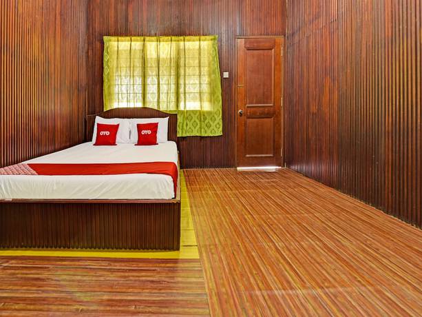 Imagen de la habitación del Hotel OYO 90278 Redzwan\'s Beach Resort. Foto 9