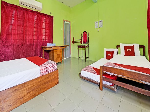 Imagen de la habitación del Hotel OYO 90278 Redzwan\'s Beach Resort. Foto 10
