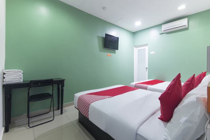 Imagen de la habitación del Hotel OYO 90296 Red Orange Port Klang. Foto 3