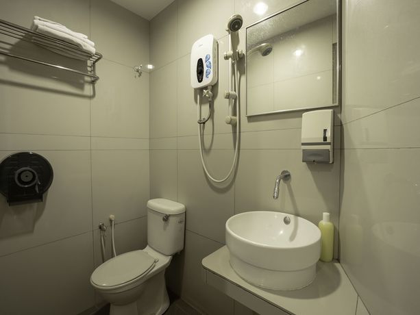 Imagen de la habitación del Hotel OYO 903 Happy 92. Foto 4