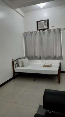 Imagen de la habitación del Hotel OYO 903 Tesoro Apartments. Foto 4