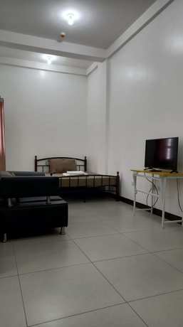 Imagen de la habitación del Hotel OYO 903 Tesoro Apartments. Foto 5