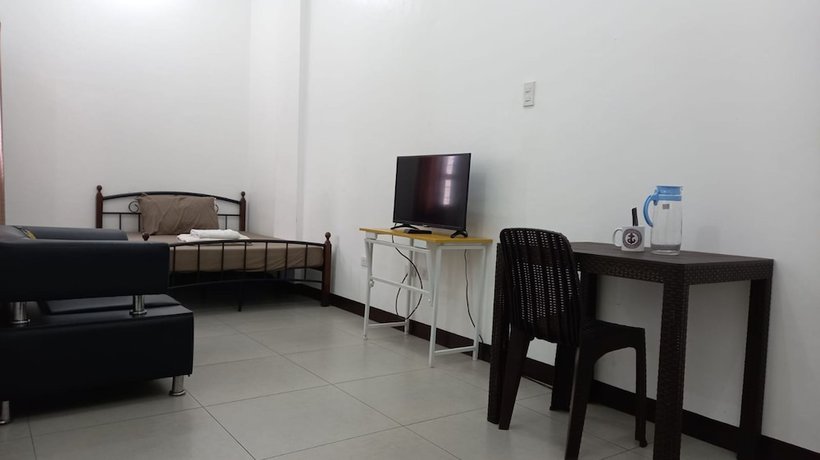 Imagen de la habitación del Hotel OYO 903 Tesoro Apartments. Foto 8