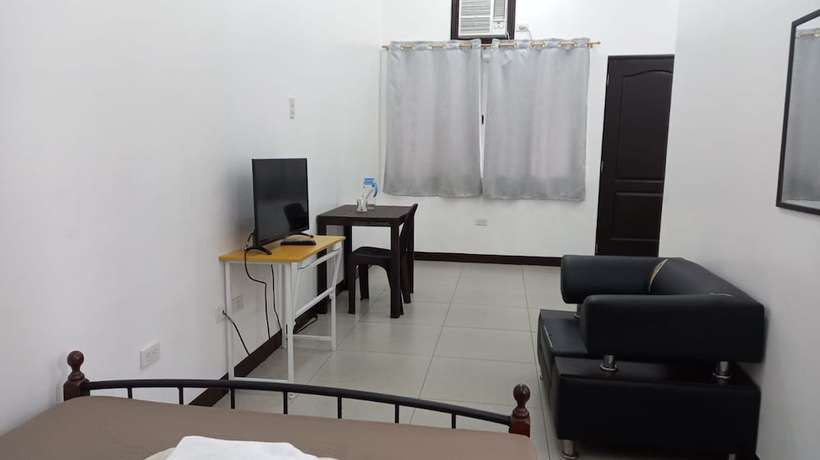 Imagen de la habitación del Hotel OYO 903 Tesoro Apartments. Foto 9