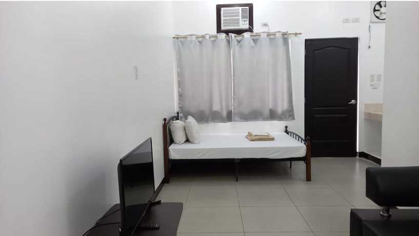 Imagen de la habitación del Hotel OYO 903 Tesoro Apartments. Foto 10