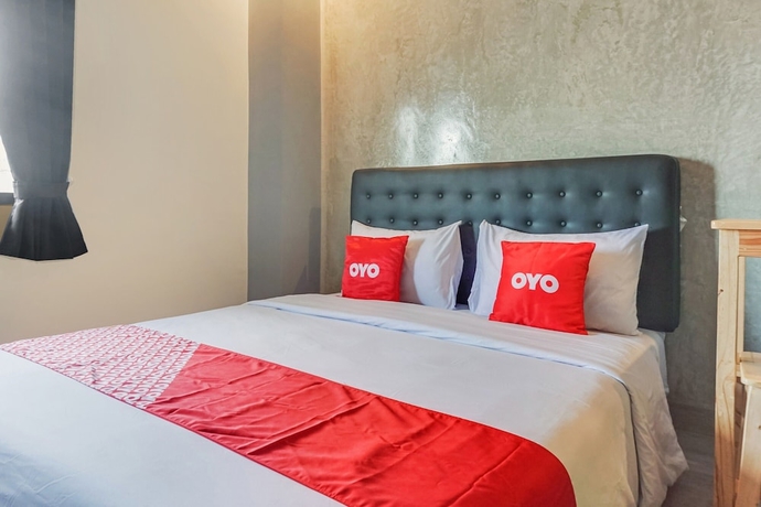 Imagen de la habitación del Hotel OYO 90305 De Umbrela Mansion Syari\'ah Ciputat. Foto 2