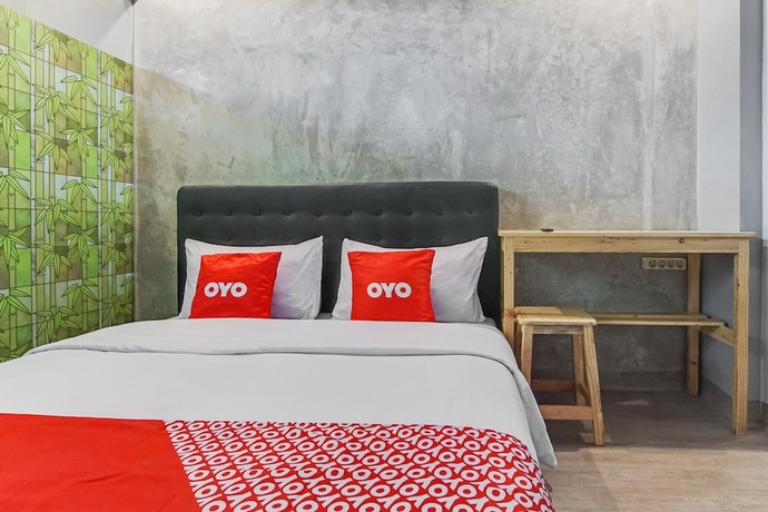 Imagen de la habitación del Hotel OYO 90305 De Umbrela Mansion Syari\'ah Ciputat. Foto 3