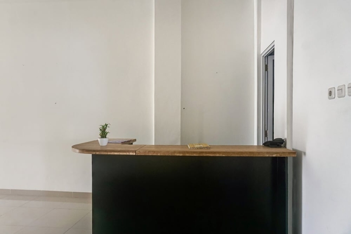Imagen de los interiores del Hotel OYO 90305 De Umbrela Mansion Syari\'ah Ciputat. Foto 17