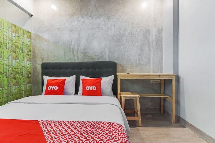 Imagen de la habitación del Hotel OYO 90305 De Umbrela Mansion Syari\'ah Ciputat. Foto 4