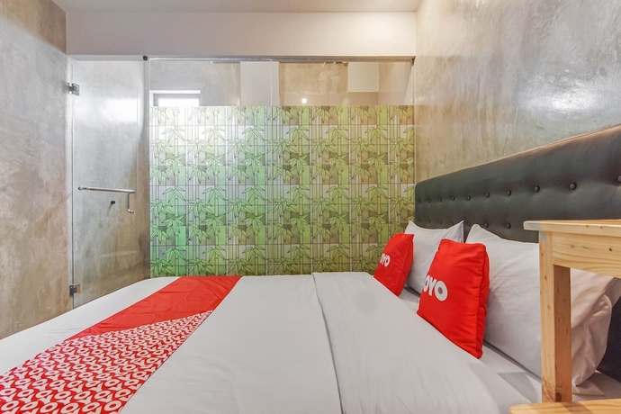Imagen de la habitación del Hotel OYO 90305 De Umbrela Mansion Syari\'ah Ciputat. Foto 5