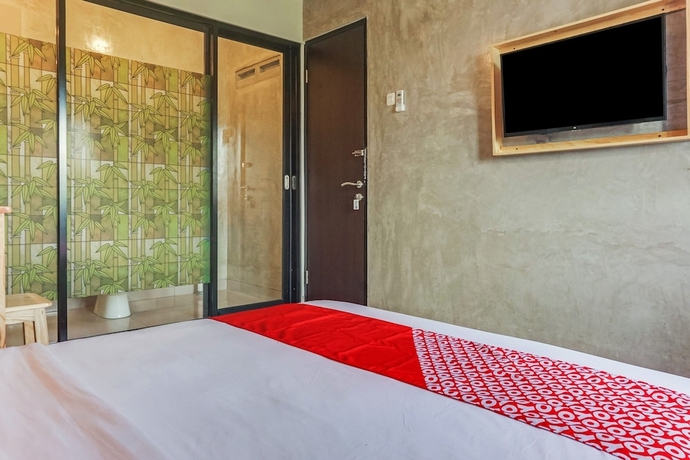 Imagen de la habitación del Hotel OYO 90305 De Umbrela Mansion Syari\'ah Ciputat. Foto 10