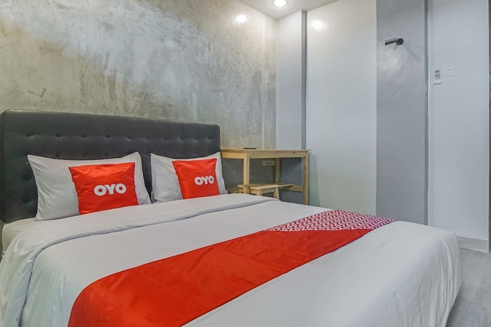 Imagen de la habitación del Hotel OYO 90305 De Umbrela Mansion Syari\'ah Ciputat. Foto 16