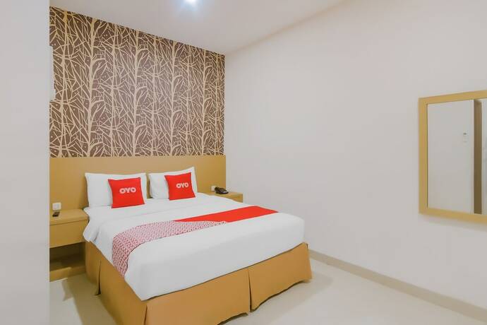 Imagen de la habitación del Hotel OYO 90312 Bahu Bay. Foto 14