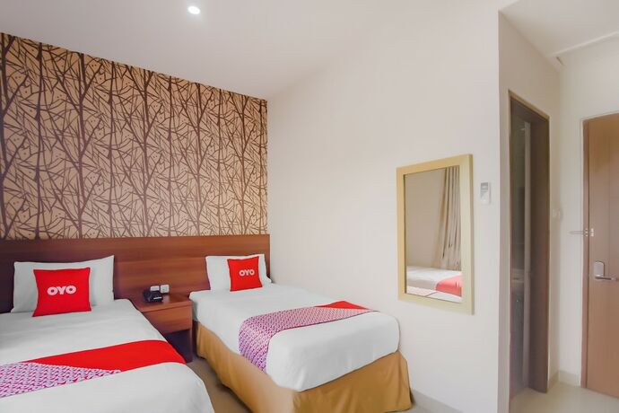 Imagen de la habitación del Hotel OYO 90312 Bahu Bay. Foto 17