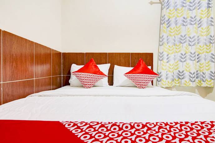 Imagen de la habitación del Hotel OYO 90322 Joy Homestay Near Bella Terra Lifestyle Center. Foto 5