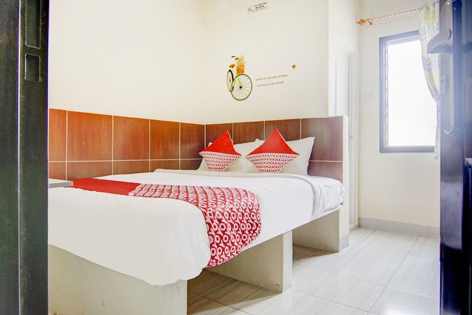 Imagen de la habitación del Hotel OYO 90322 Joy Homestay Near Bella Terra Lifestyle Center. Foto 6