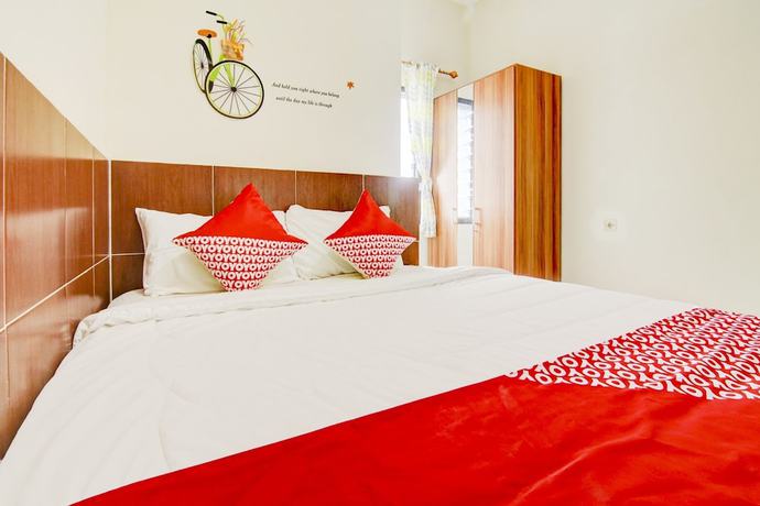 Imagen de la habitación del Hotel OYO 90322 Joy Homestay Near Bella Terra Lifestyle Center. Foto 7