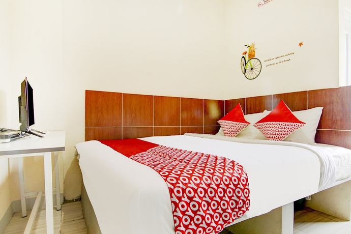 Imagen de la habitación del Hotel OYO 90322 Joy Homestay Near Bella Terra Lifestyle Center. Foto 8