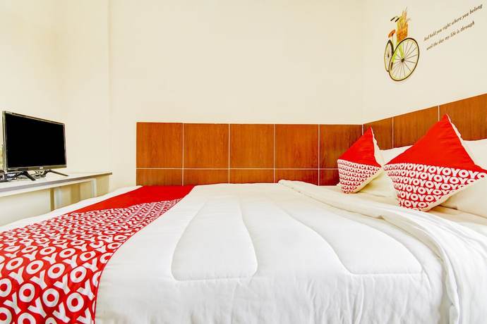 Imagen de la habitación del Hotel OYO 90322 Joy Homestay Near Bella Terra Lifestyle Center. Foto 10