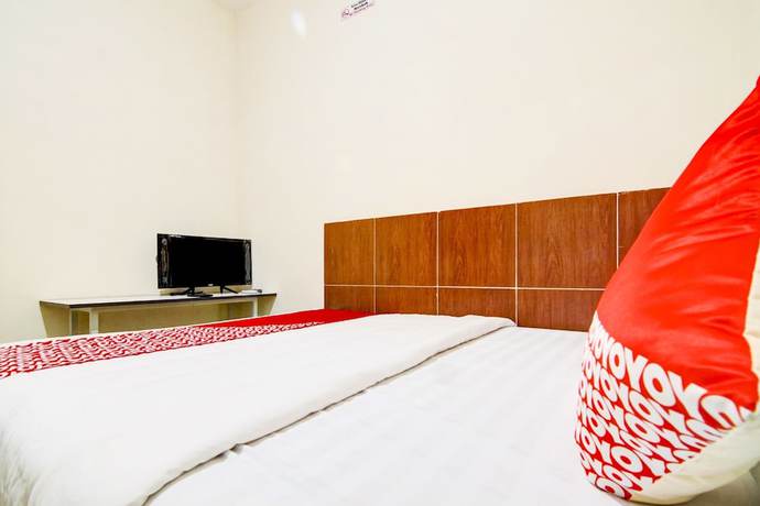 Imagen de la habitación del Hotel OYO 90322 Joy Homestay Near Bella Terra Lifestyle Center. Foto 12