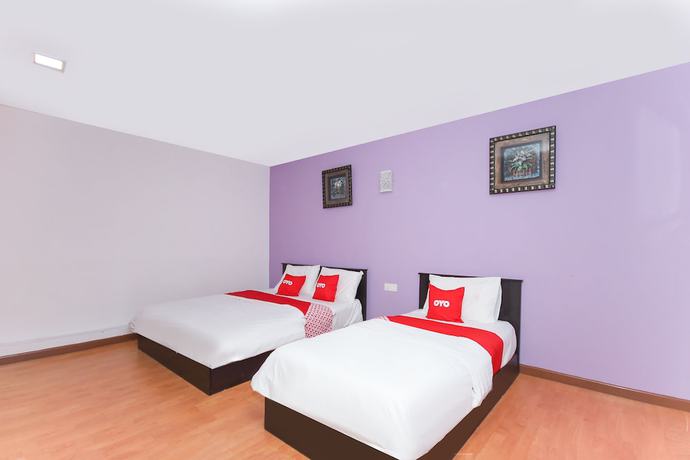 Imagen de la habitación del Hotel OYO 90345 TM. Foto 3