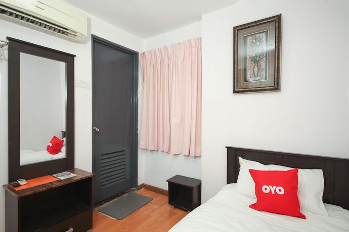 Imagen de la habitación del Hotel OYO 90345 TM. Foto 4